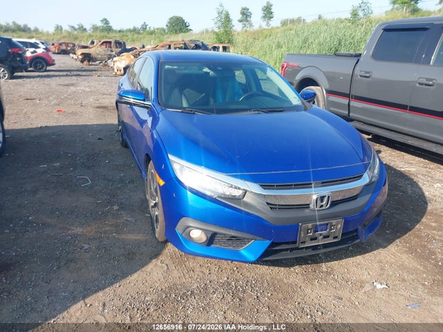 2017 Honda Civic Touring მანქანა იყიდება აუქციონზე, vin: 2HGFC1F99HH103973, აუქციონის ნომერი: 12656916