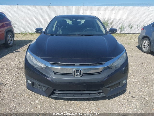 12657068 :رقم المزاد ، 2HGFC1F92GH114604 vin ، 2016 Honda Civic Touring مزاد بيع