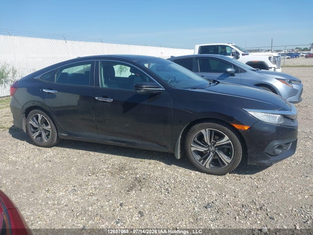 12657068 :رقم المزاد ، 2HGFC1F92GH114604 vin ، 2016 Honda Civic Touring مزاد بيع