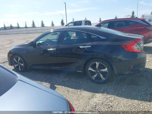 12657068 :رقم المزاد ، 2HGFC1F92GH114604 vin ، 2016 Honda Civic Touring مزاد بيع