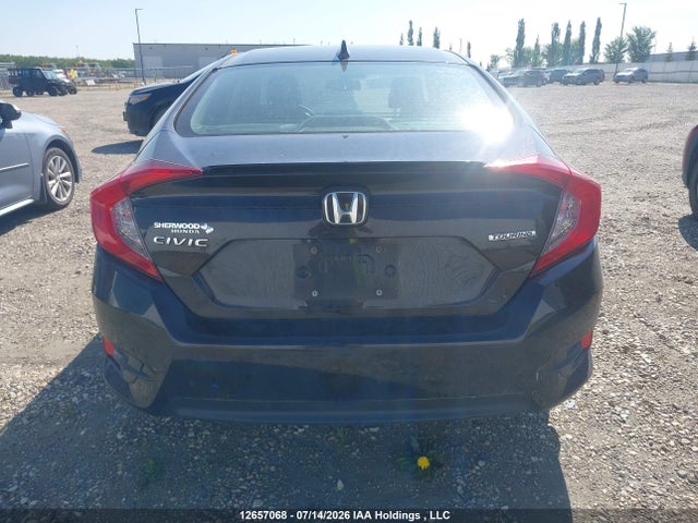 12657068 :رقم المزاد ، 2HGFC1F92GH114604 vin ، 2016 Honda Civic Touring مزاد بيع