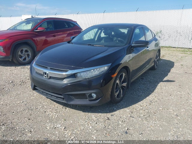 12657068 :رقم المزاد ، 2HGFC1F92GH114604 vin ، 2016 Honda Civic Touring مزاد بيع