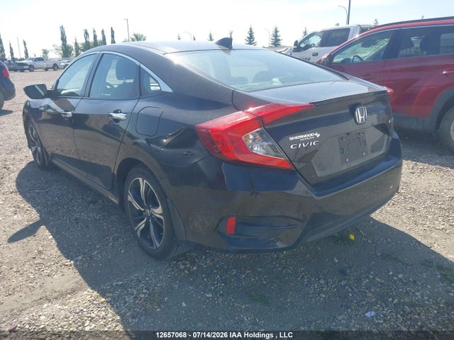 12657068 :رقم المزاد ، 2HGFC1F92GH114604 vin ، 2016 Honda Civic Touring مزاد بيع