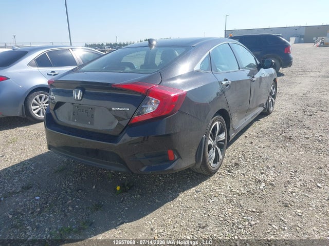 12657068 :رقم المزاد ، 2HGFC1F92GH114604 vin ، 2016 Honda Civic Touring مزاد بيع
