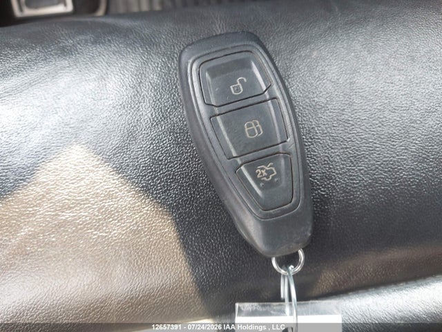 12657391 :رقم المزاد ، 1FADP3L93EL214727 vin ، 2014 Ford Focus St St مزاد بيع