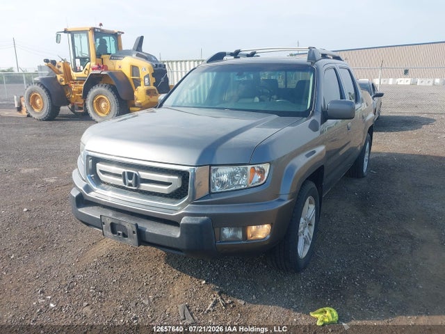 2010 Honda Ridgeline Rtl მანქანა იყიდება აუქციონზე, vin: 5FPYK1F52AB501133, აუქციონის ნომერი: 12657640