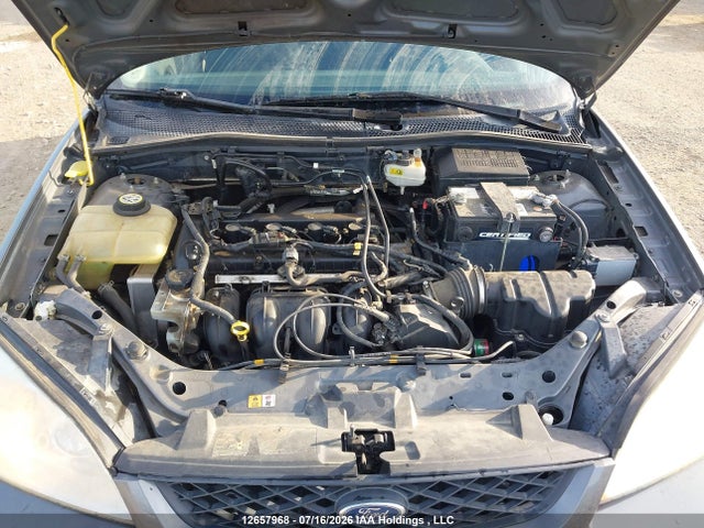12657968 :رقم المزاد ، 1FAFP37N97W276859 vin ، 2007 Ford Focus Ses مزاد بيع