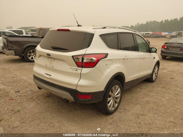 Продаж на аукціоні авто 2017 Ford Escape Titanium, vin: 1FMCU9J9XHUD46902, номер лоту: 12658089