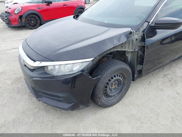 Auction sale of the 2016 Honda Civic Sedan, vin: 2HGFC2F5XGH013717, lot number: 12658246