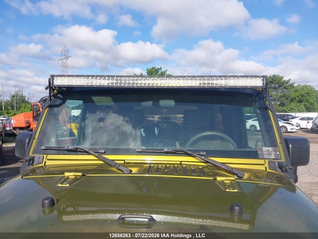 2007 Jeep Wrangler Sahara მანქანა იყიდება აუქციონზე, vin: 1J8GA59177L205806, აუქციონის ნომერი: 12658263