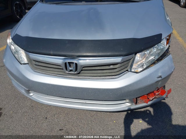 Продажа на аукционе авто 2012 Honda Civic Lx, vin: 2HGFB2F51CH028913, номер лота: 12658428
