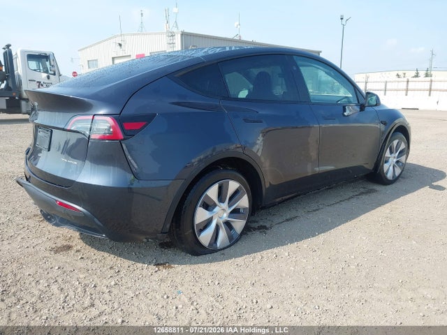Tesla Model Y 2024 7SAYGDEE0RF079620 Image 4