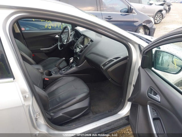 2014 Ford Focus Titanium მანქანა იყიდება აუქციონზე, vin: 1FADP3N27EL261209, აუქციონის ნომერი: 12658887