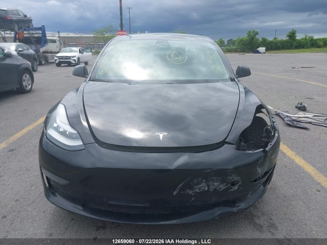 Продажа на аукционе авто 2021 Tesla Model 3, vin: 5YJ3E1EAXMF852398, номер лота: 12659060