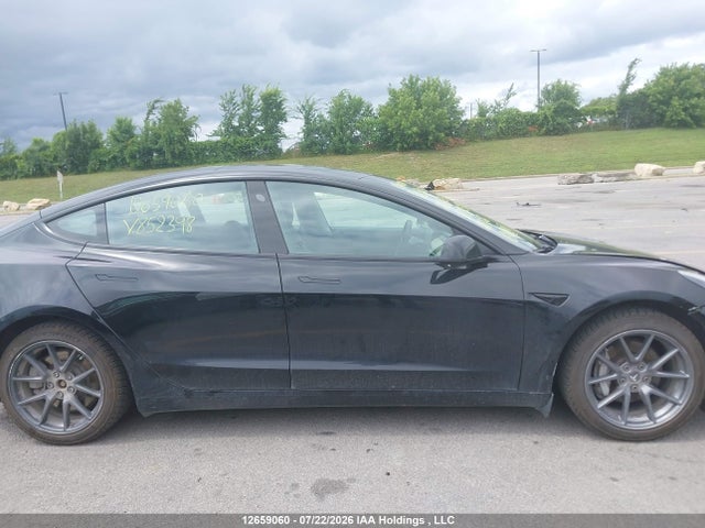 Продажа на аукционе авто 2021 Tesla Model 3, vin: 5YJ3E1EAXMF852398, номер лота: 12659060