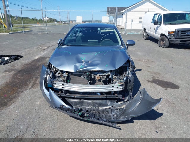 12659710 :رقم المزاد ، 5YFBPMBE7MP186295 vin ، 2021 Toyota Corolla L مزاد بيع