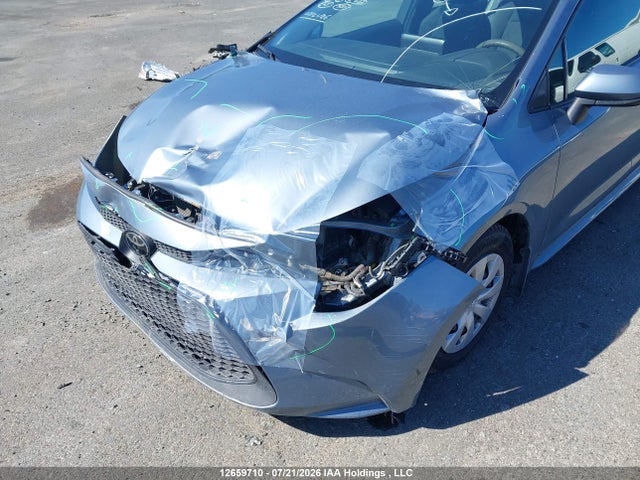 12659710 :رقم المزاد ، 5YFBPMBE7MP186295 vin ، 2021 Toyota Corolla L مزاد بيع