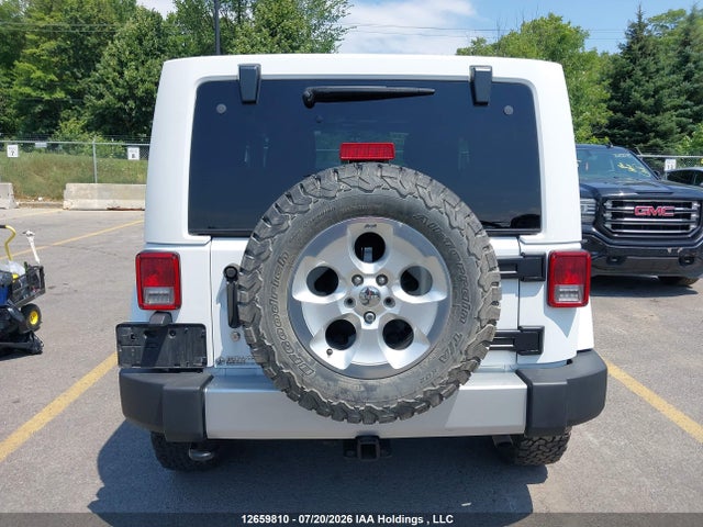 12659810 :رقم المزاد ، 1C4AJWBG7FL750310 vin ، 2015 Jeep Wrangler Sahara مزاد بيع