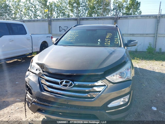 2014 Hyundai Santa Fe Sport 2.0t Limited მანქანა იყიდება აუქციონზე, vin: 5XYZUDLA2EG140396, აუქციონის ნომერი: 12659951