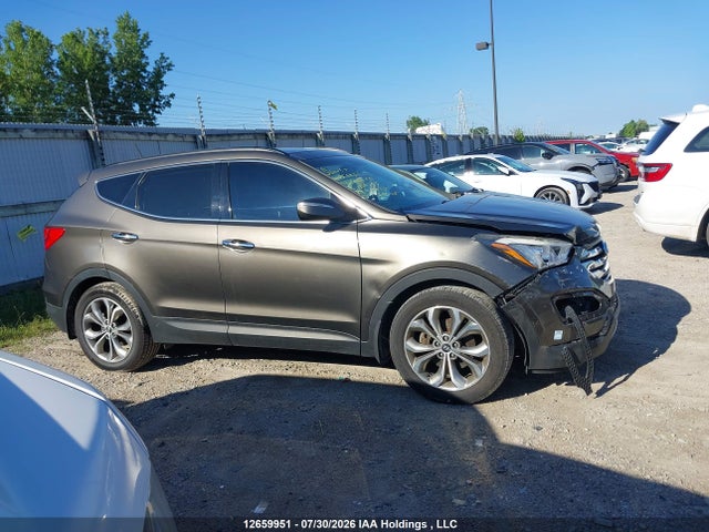 2014 Hyundai Santa Fe Sport 2.0t Limited მანქანა იყიდება აუქციონზე, vin: 5XYZUDLA2EG140396, აუქციონის ნომერი: 12659951