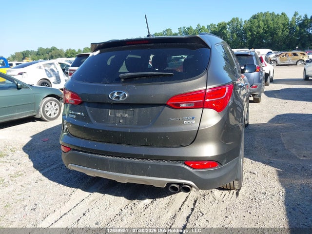 2014 Hyundai Santa Fe Sport 2.0t Limited მანქანა იყიდება აუქციონზე, vin: 5XYZUDLA2EG140396, აუქციონის ნომერი: 12659951