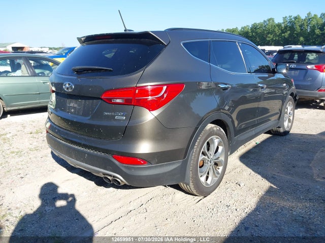 2014 Hyundai Santa Fe Sport 2.0t Limited მანქანა იყიდება აუქციონზე, vin: 5XYZUDLA2EG140396, აუქციონის ნომერი: 12659951