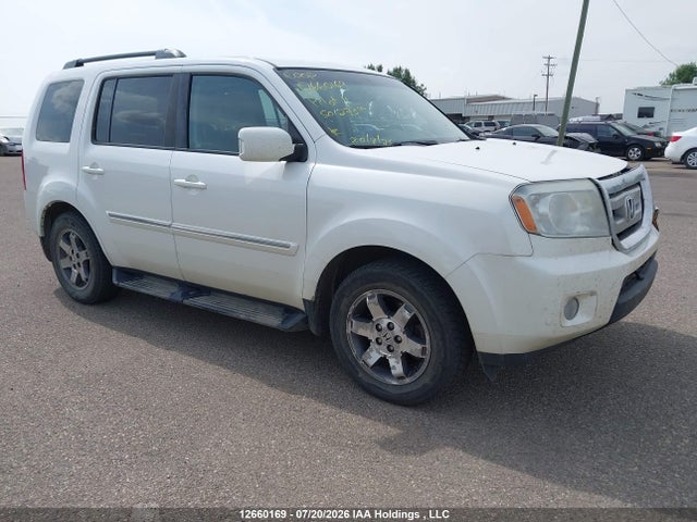 Продажа на аукционе авто 2011 Honda Pilot Touring, vin: 5FNYF4H97BB501273, номер лота: 12660169