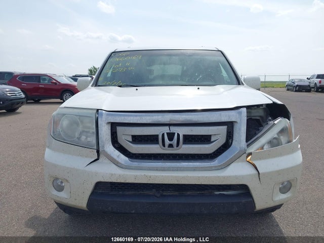 Продажа на аукционе авто 2011 Honda Pilot Touring, vin: 5FNYF4H97BB501273, номер лота: 12660169