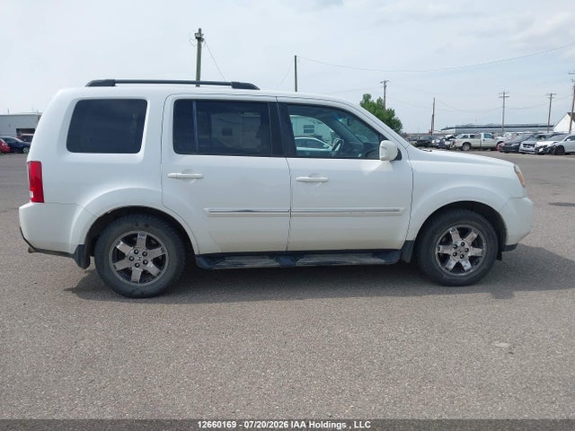 Продажа на аукционе авто 2011 Honda Pilot Touring, vin: 5FNYF4H97BB501273, номер лота: 12660169
