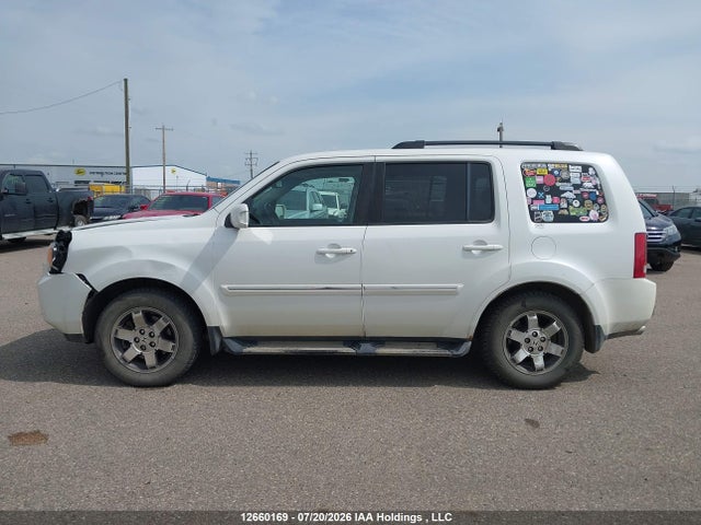 Продажа на аукционе авто 2011 Honda Pilot Touring, vin: 5FNYF4H97BB501273, номер лота: 12660169