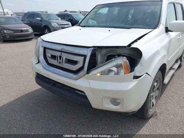 Продажа на аукционе авто 2011 Honda Pilot Touring, vin: 5FNYF4H97BB501273, номер лота: 12660169