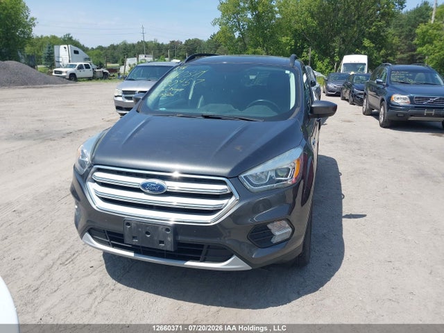 Продажа на аукционе авто 2018 Ford Escape, vin: 1FMCU9HD2JUB00457, номер лота: 12660371