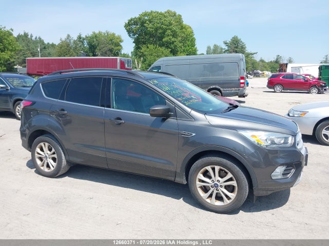 Продажа на аукционе авто 2018 Ford Escape, vin: 1FMCU9HD2JUB00457, номер лота: 12660371