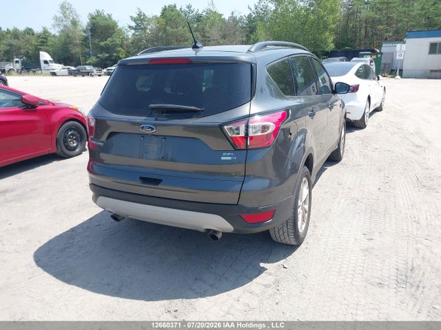 Продажа на аукционе авто 2018 Ford Escape, vin: 1FMCU9HD2JUB00457, номер лота: 12660371