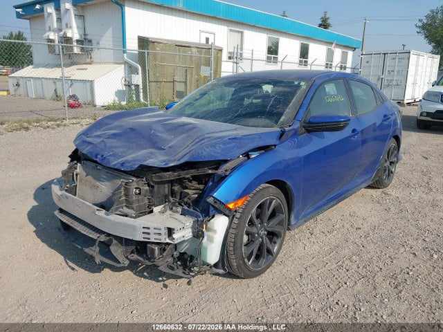 12660632 :رقم المزاد ، SHHFK7G97JU302176 vin ، 2018 Honda Civic Sport Touring مزاد بيع