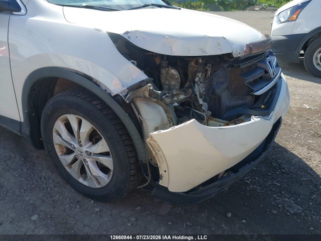2013 Honda Cr-v Touring მანქანა იყიდება აუქციონზე, vin: 2HKRM4H93DH107901, აუქციონის ნომერი: 12660844