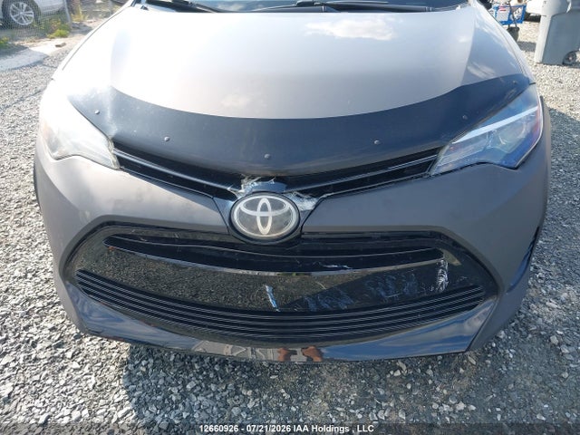 2T1BURHE2JC080507 Toyota COROLLA LE