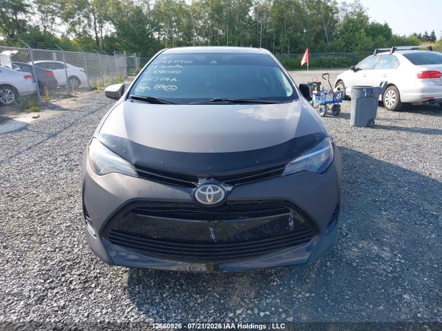 2T1BURHE2JC080507 Toyota COROLLA LE