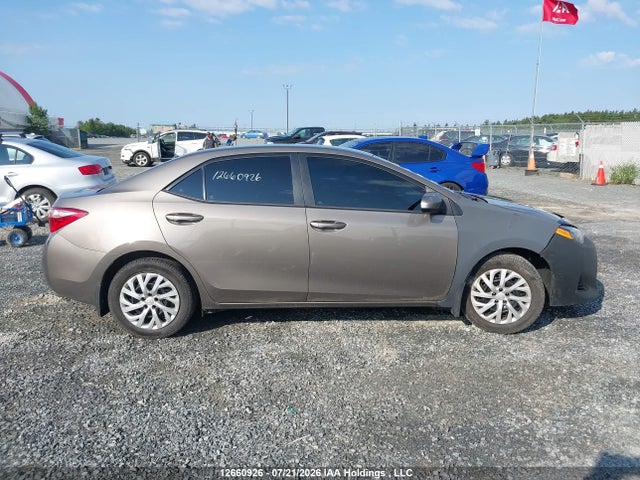 2T1BURHE2JC080507 Toyota COROLLA LE
