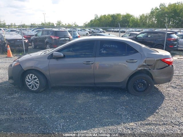 2T1BURHE2JC080507 Toyota COROLLA LE