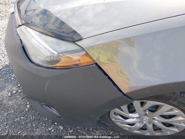 2T1BURHE2JC080507 Toyota COROLLA LE