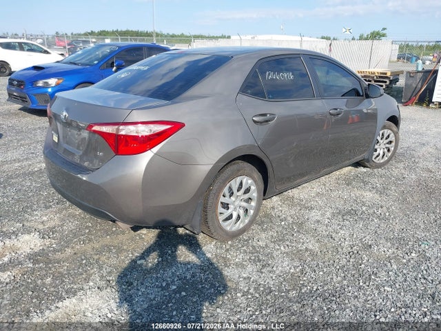 2T1BURHE2JC080507 Toyota COROLLA LE