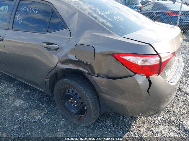 2T1BURHE2JC080507 Toyota COROLLA LE