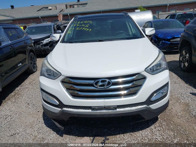 12661015 :رقم المزاد ، 5XYZUDLB4EG207489 vin ، 2014 Hyundai Santa Fe Sport 2.4 Luxury مزاد بيع