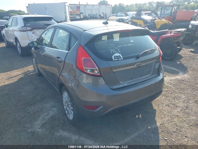 12661136 :رقم المزاد ، 3FADP4FJ7EM167695 vin ، 2014 Ford Fiesta مزاد بيع