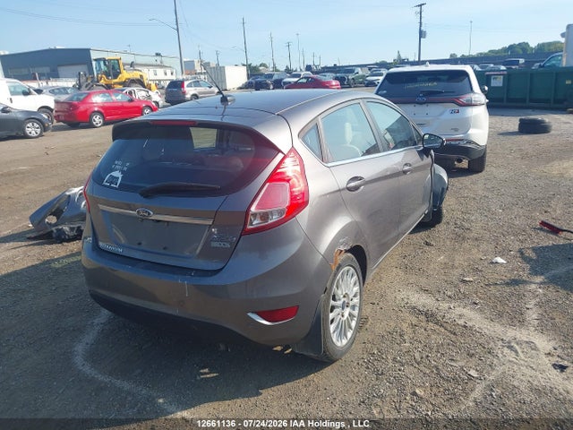 12661136 :رقم المزاد ، 3FADP4FJ7EM167695 vin ، 2014 Ford Fiesta مزاد بيع