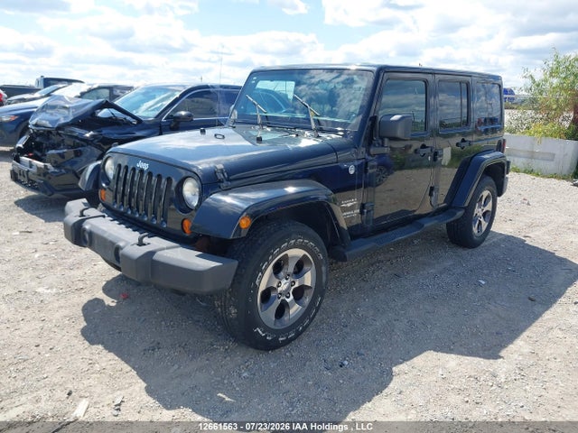 Auction sale of the 2011 Jeep Wrangler Unlimited, vin: 1J4BA5H17BL618265, lot number: 12661563