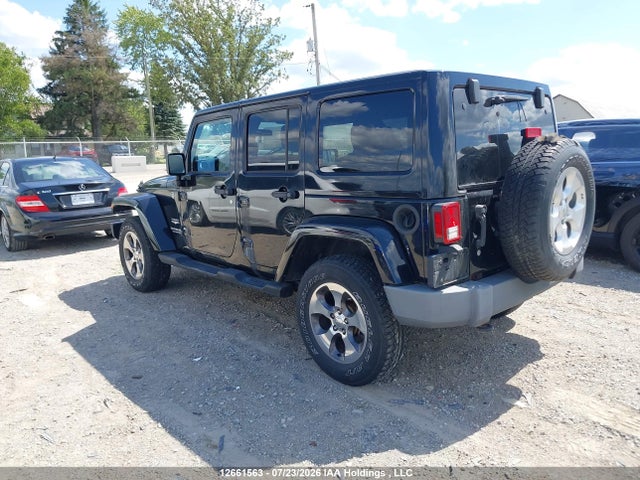Auction sale of the 2011 Jeep Wrangler Unlimited, vin: 1J4BA5H17BL618265, lot number: 12661563