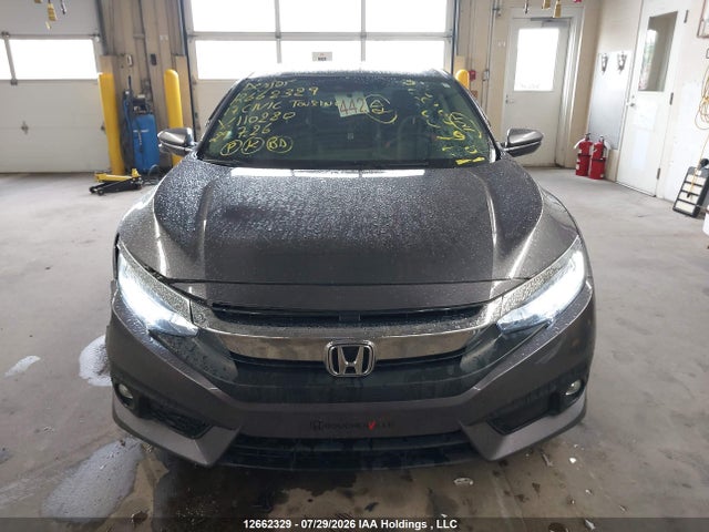 Auction sale of the 2017 Honda Civic Touring, vin: 2HGFC1F92HH110280, lot number: 12662329
