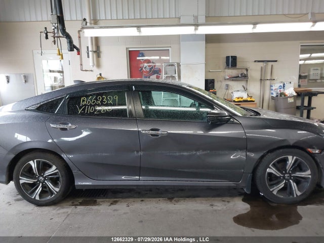 Auction sale of the 2017 Honda Civic Touring, vin: 2HGFC1F92HH110280, lot number: 12662329